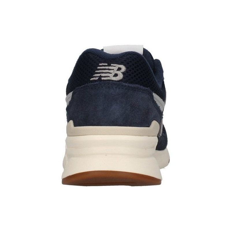 New balance 997 en color azul marino y gris de moda